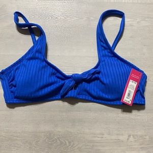 Blue swimsuit top.